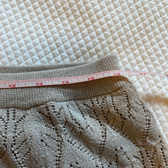 Adrienne Vittadini sparky silver sweater skirt with slight handkerchief hem. - Picture 6 of 9